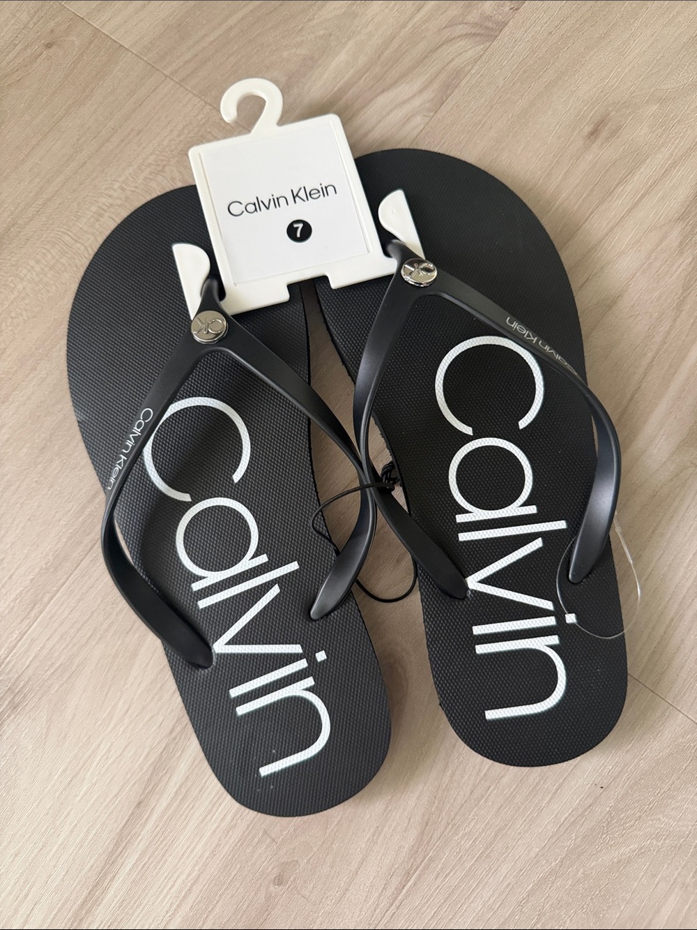 Calvin Klein Black Flip Flops with White Logo
